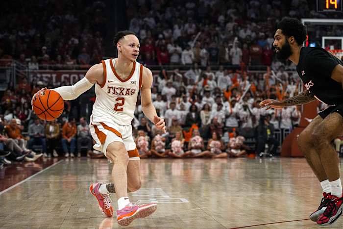 Texas Longhorns guard Chendall Weaver (2) dribbles the ball towards the Houston basket during the basketball game at the Moody Center on Monday, Jan. 29, 2024 in Austin